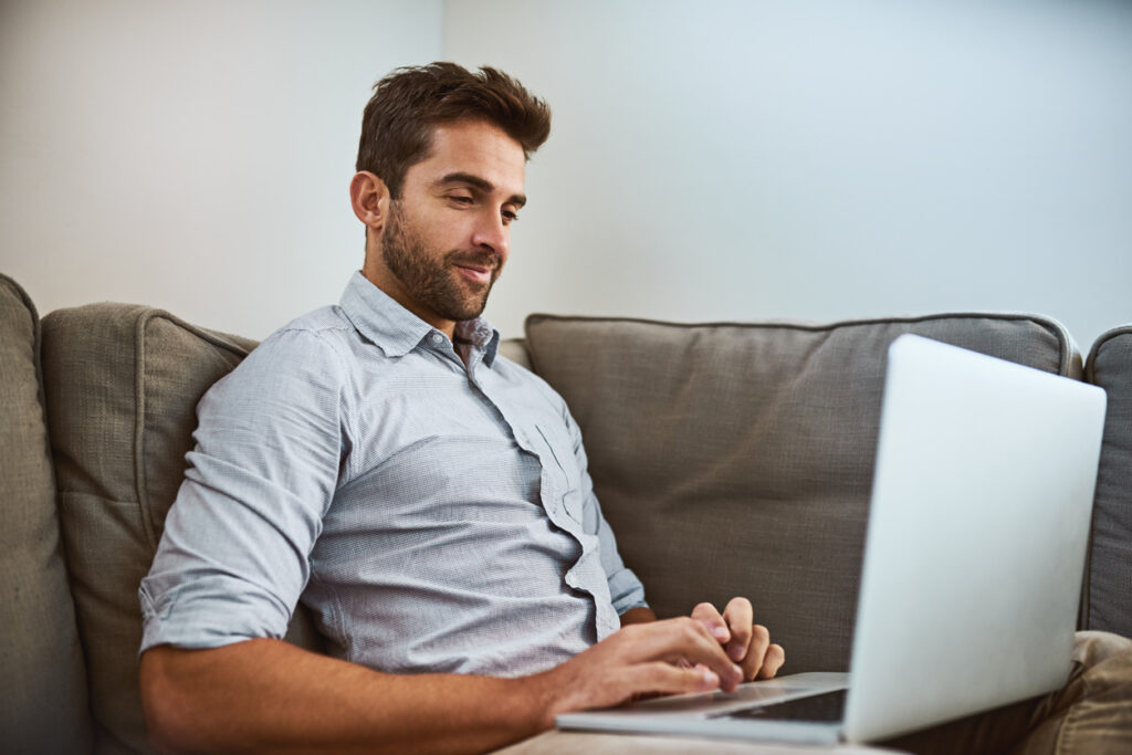 focused young man looking up facebook messenger alternative