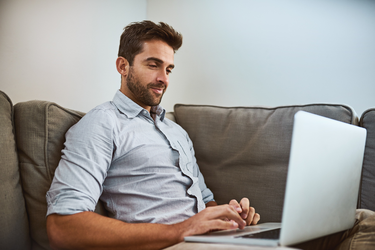 focused young man looking up facebook messenger alternative